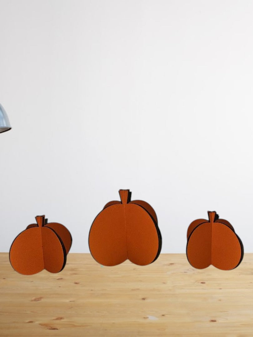 3 pumpkins hand painted and cut