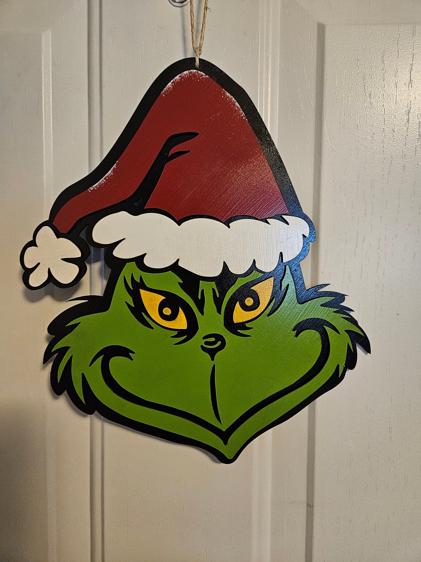 Grinchin' It Up This Christmas door hanger